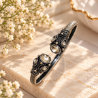 Patterned adjustable cuff bracelet with black detailing and round clear accents | SISTERHOODS-SHA256:a9488f1e651b15b0b47391b722ad5c01c9ae2245fa6a17a59eb37ed6c97f5bf0