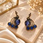 Blue peacock-inspired oxidized dangle earring with ornate detailing | SISTERHOODS-SHA256:a52d9cf68cad8478d390601b18390cc6c79c09288bc0166ed0ec44bcb357884c