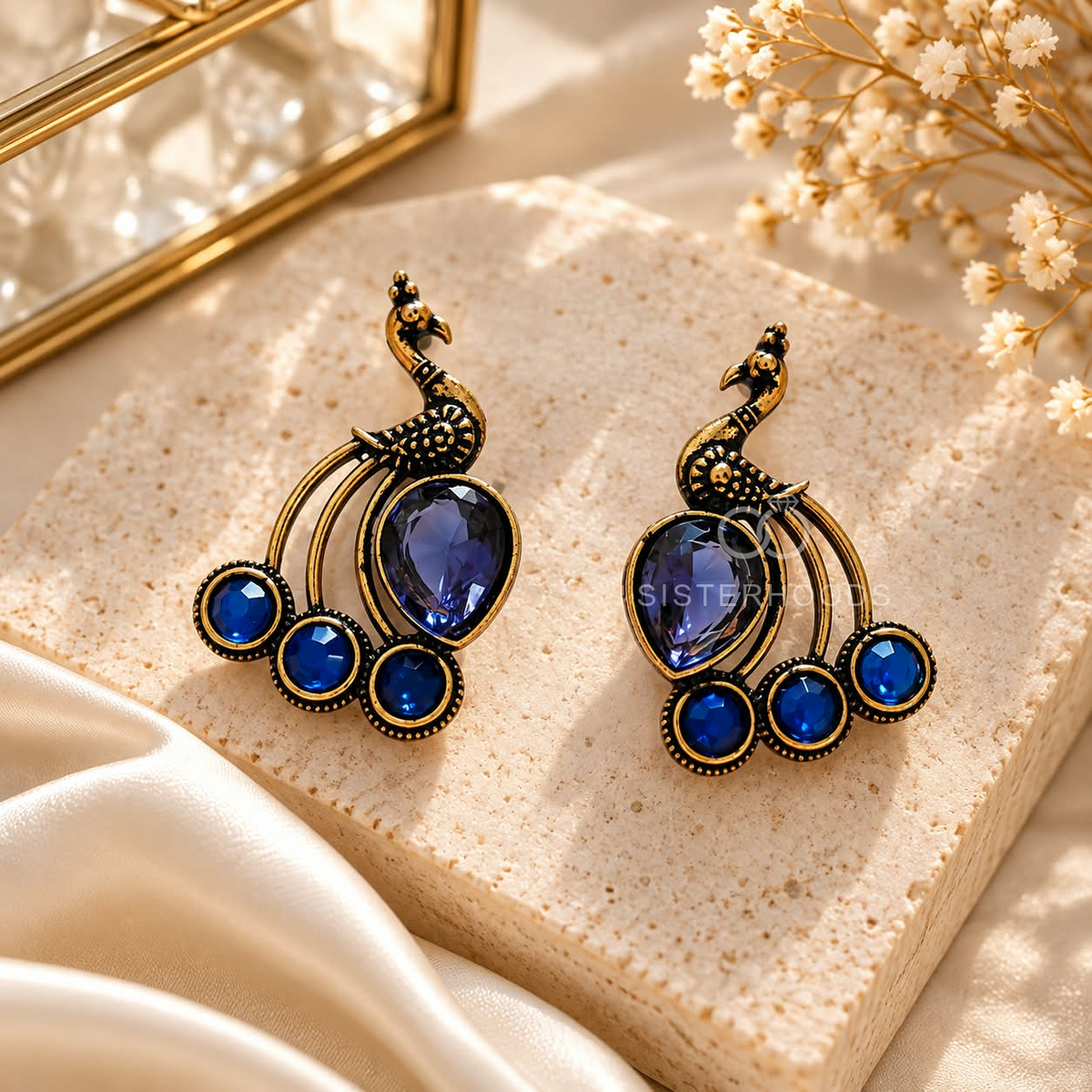 Blue peacock-inspired oxidized dangle earring with ornate detailing | SISTERHOODS-SHA256:a52d9cf68cad8478d390601b18390cc6c79c09288bc0166ed0ec44bcb357884c