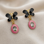 Black butterfly-inspired earrings with pink oval drops and clear faceted centre accents | SISTERHOODS-SHA256:010322007d33e74617803a5089a5e77a3dd7fabbf251ff871ababe13dd7894f5