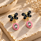 Black butterfly-inspired earrings with pink oval drops and clear faceted centre accents | SISTERHOODS-SHA256:df7d924ad6429c18d26ac9b55a8c72b51b92aa8e505b8f6411c2bd98e9b893fa