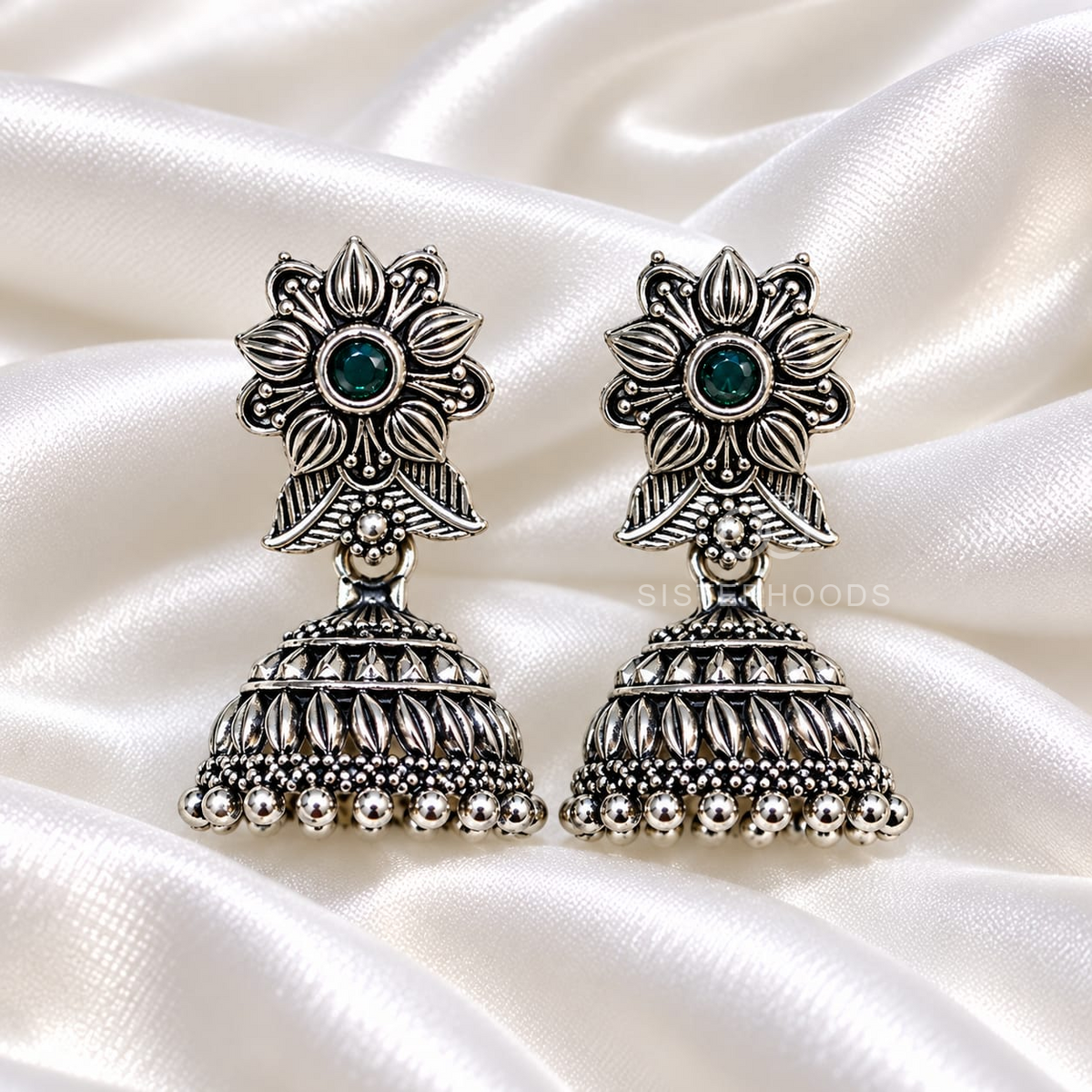 Ornate floral jhumka earrings with green centre accents and beaded dome fringes | SISTERHOODS-SHA256:3d0ccbf9ebf5b33c067d01bcb05fb2fdfab88172ccac40dfbad2d0cc0f53d82f