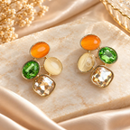 Multicolour gold-toned dangle earrings with orange, green, cream and champagne accents | SISTERHOODS-SHA256:5eeb99c8740aeecb260dae31812c148be3011ebafbd4d9db1418e18bd273ca64