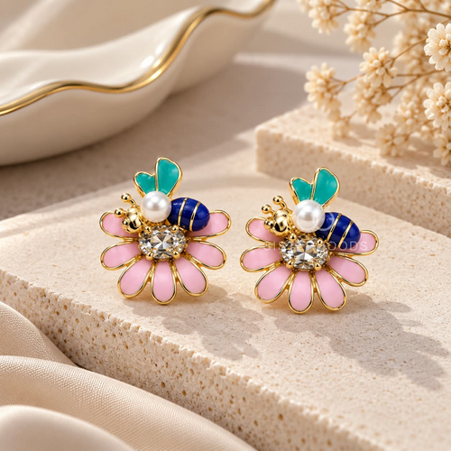 Multicolour floral stud earrings with pink petals, teal leaves, navy accents, white beads and sparkling centres | SISTERHOODS-SHA256:f52b80b5afc43c3aec4ad3718a9316dccc3f67fcd1957b3fffaffe4b3287a750