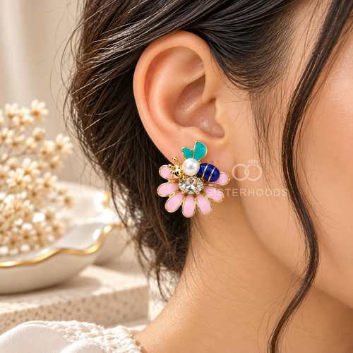Multicolour floral stud earrings with pink petals, teal leaves, navy accents, white beads and sparkling centres | SISTERHOODS-SHA256:dd3e4106123719ad0446e7e413b0fcaa8b0cfa2175dbdb18519127a8f5b4ec2f