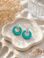 Turquoise textured hoop earrings with silver-tone details | SISTERHOODS-SHA256:86e2a92701fdd3536daeac9b1cabfa0cdc5b4ddf6999ac8113701d4b9a5f6ba4