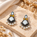 Multicolour oxidized dangle earrings with white beads, mustard accents and geometric centre details | SISTERHOODS-SHA256:91a5866b2c37ce853cb04dba7bc6ee8e9dfeccc5f5bf600191cd541ec7251429