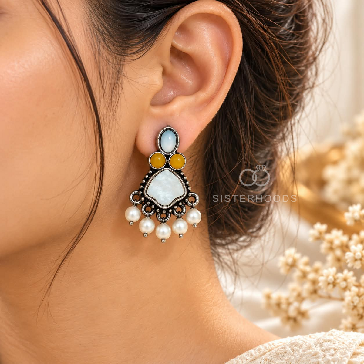 Multicolour oxidized dangle earrings with white beads, mustard accents and geometric centre details | SISTERHOODS-SHA256:cd86622caf48d55da283ca1b5b04de1cd4dab6d17c4d2bf83b349c9fcf8175a4
