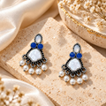 Blue and white beaded oxidized dangle earrings with a statement drop design | SISTERHOODS-SHA256:4aca3dea6e85198c497eb11524df61765a396c2ed78d7cc3c88188936efe8a2f