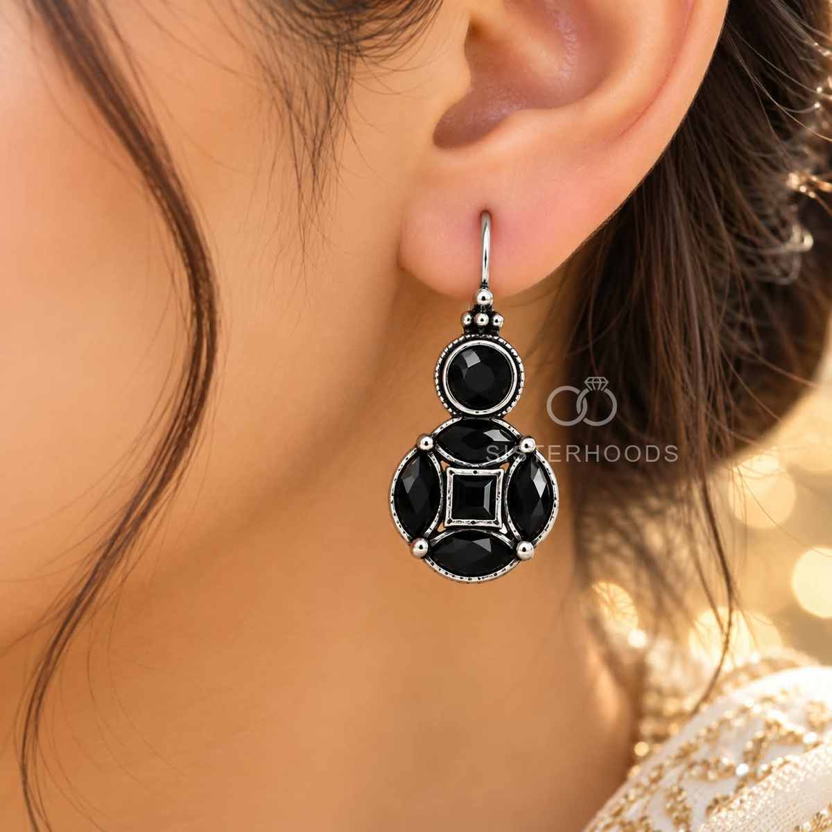 Black faceted geometric oxidized dangle earring with silver-tone detailing | SISTERHOODS-SHA256:4da1d2fbc600b62bf006a297572bf787d4386a8f5e8269236b8481344c1e7343