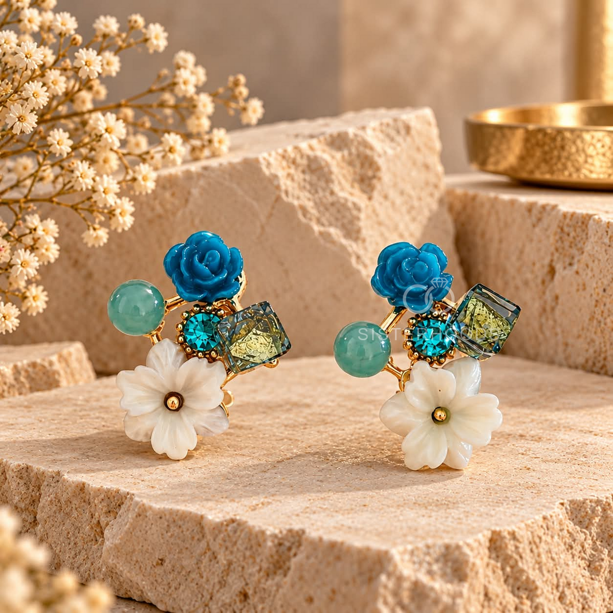 Colourful floral stud earrings with blue roses, white flowers and geometric accents | SISTERHOODS-SHA256:2c686f69dd11dde55b0320572b920f2322617b1797450f5d85b14b6385520dbb