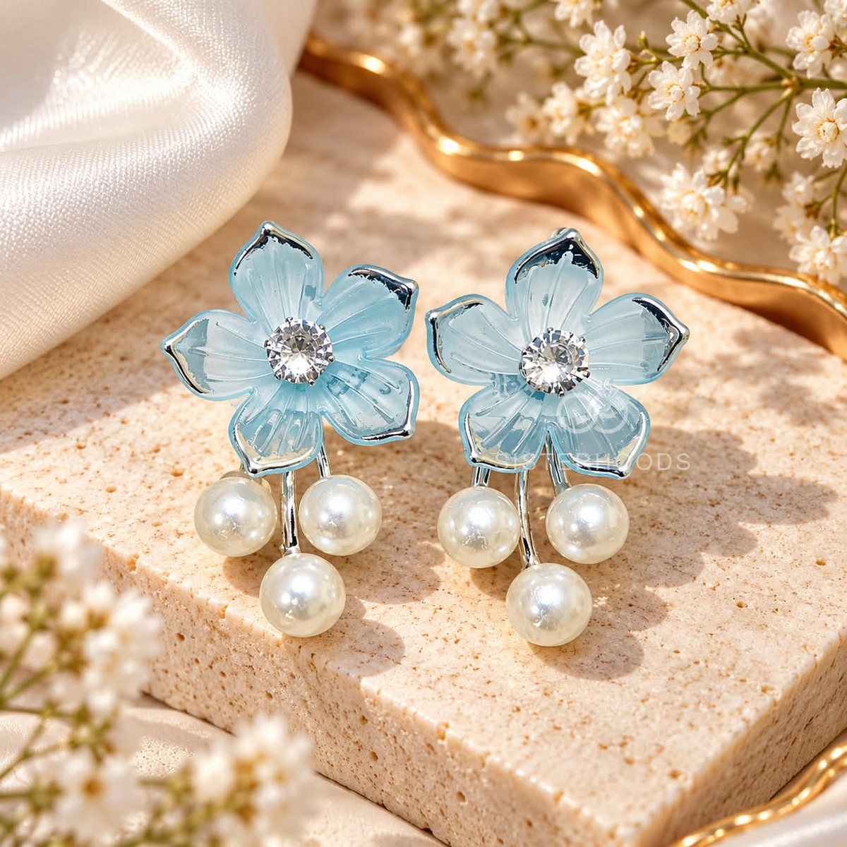Blue floral dangle earring with sparkling centre and three white pearl drops | SISTERHOODS-SHA256:f7fd779589acbcbe2091682c923726bf431516c1789e2938fc5d5b7d9edfe2c3