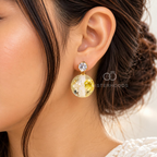 Round clear floral drop earrings with gold accents and sparkling stud tops | SISTERHOODS-SHA256:0b3a773370b8886148fe261568817c3d54c934e9040e2985fee85430d2d1fdeb