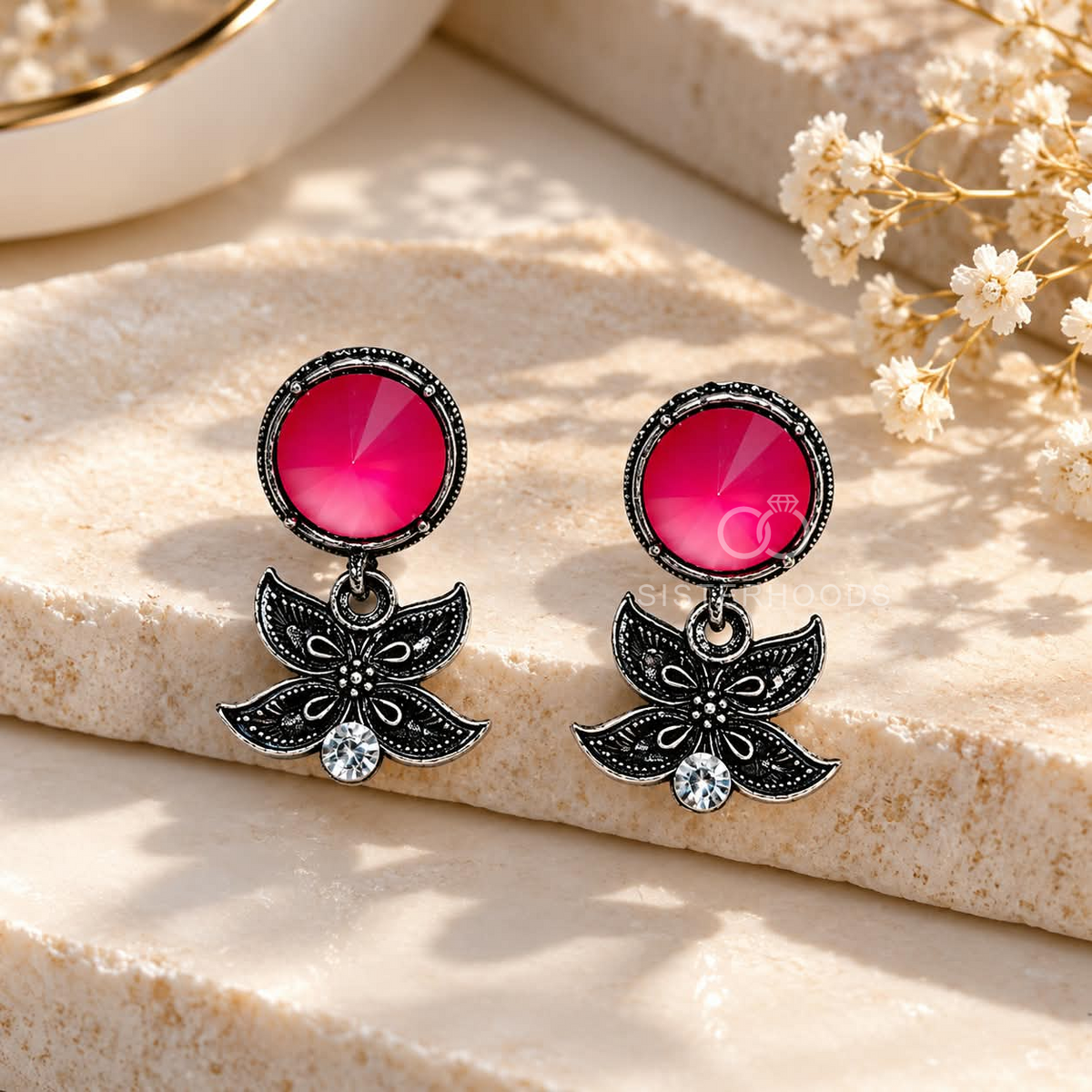 Black floral dangle earrings with vivid pink round accents and clear stones | SISTERHOODS-SHA256:227af33275e30496ee2ce59530acd5450e79e107df12b475ac991d5a8d059282