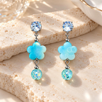 Turquoise flower dangle earring with sparkling round accents | SISTERHOODS-SHA256:641d3b34f65e78622054a91e1cac471711ccbd4d9d2dd1589cb25534cff737d8