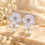 Pink flower earrings with a sparkling centre and three dangling white pearls | SISTERHOODS-SHA256:f79ee6bb560467d21ecb8f30092522cadbac451b69dabec5b52e535d5d6894fd