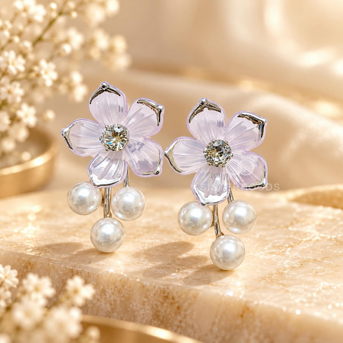 Pink flower earrings with a sparkling centre and three dangling white pearls | SISTERHOODS-SHA256:f79ee6bb560467d21ecb8f30092522cadbac451b69dabec5b52e535d5d6894fd