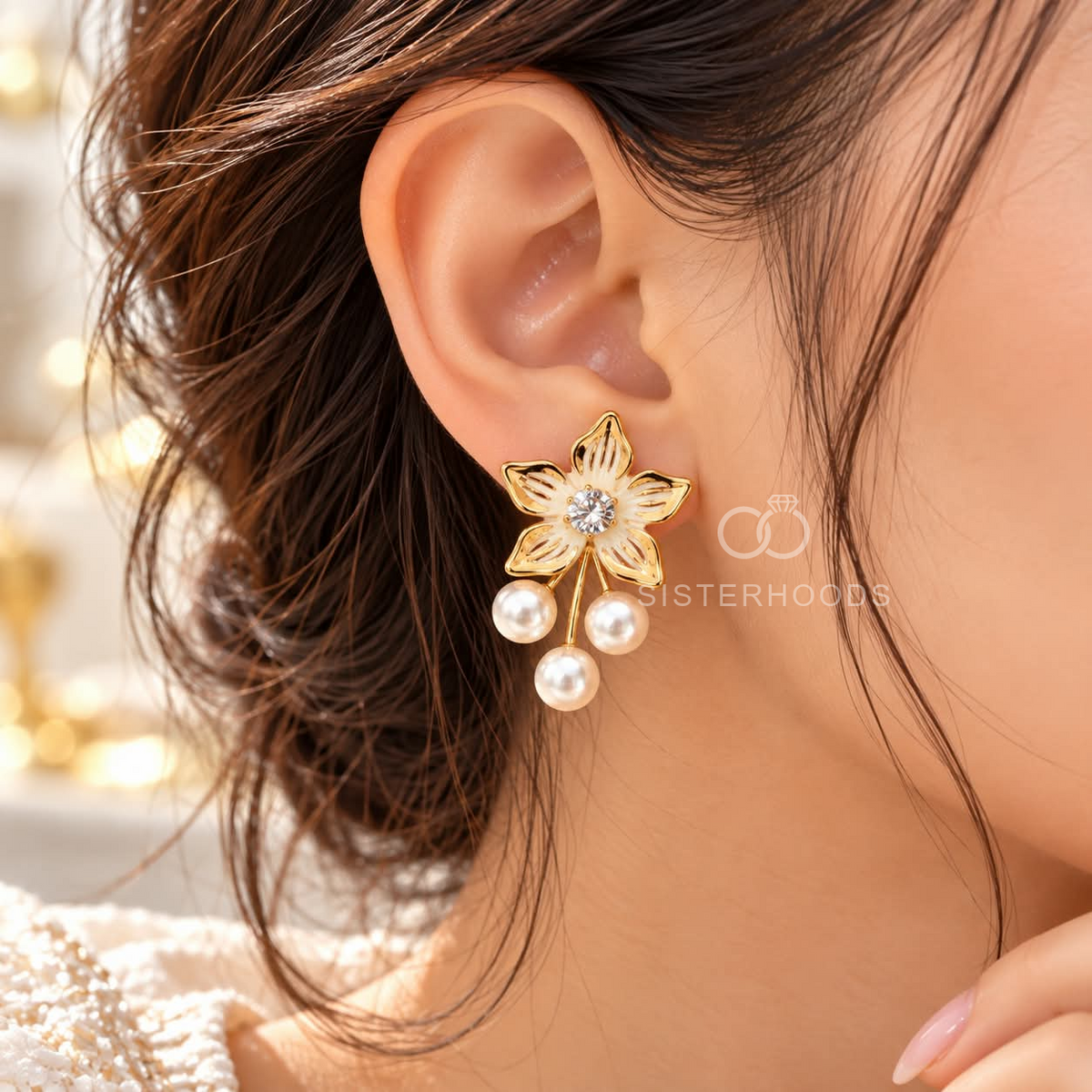 Gold-tone floral dangle earring with sparkling centre and three white pearl drops | SISTERHOODS-SHA256:5972015d83a4640d1ef3fc21b2b7220fc6af31be7e44946cb39b2114fdddc5c4