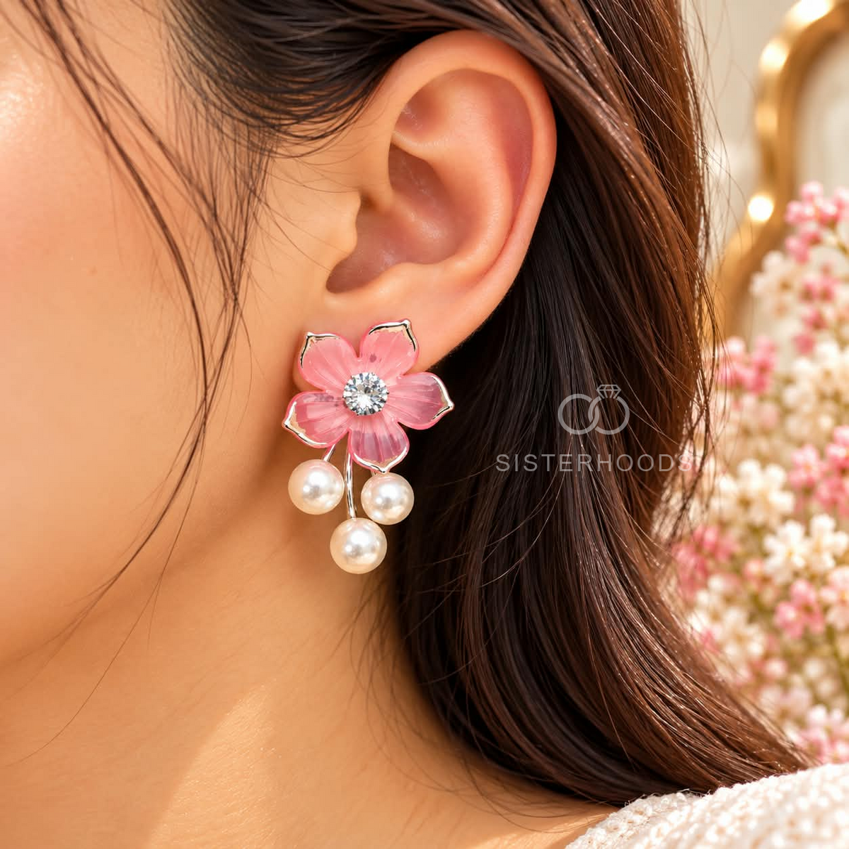 Pink flower dangle earrings with sparkling centres and white pearl drops | SISTERHOODS-SHA256:a1b9b8c062ef5205afcbea90e71b58d7b03953bbec390c1c688acf293c0cb73d