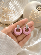 Pink textured hoop earrings with silver-tone top details | SISTERHOODS-SHA256:5f7a4dc2ac887bf28d1e45a7a2edd2c99cd7759e657a6aee42d498ac95618992