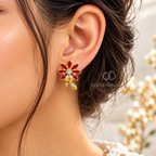 Red floral stud earring with clear sparkling accents and a dangling leaf-shaped detail | SISTERHOODS-SHA256:78064e80d32c0d72dcb203142f4b1a91704a4ea9af5c8e3d4896d0a35cb6f12f
