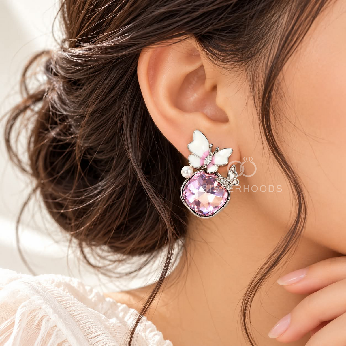 Pink butterfly dangle earrings with white floral details, pearl accents and faceted pink centres | SISTERHOODS-SHA256:ac4e104c1d29e0755f0d87021f82874dce5209d3eddea415786bdf31e797e0fb