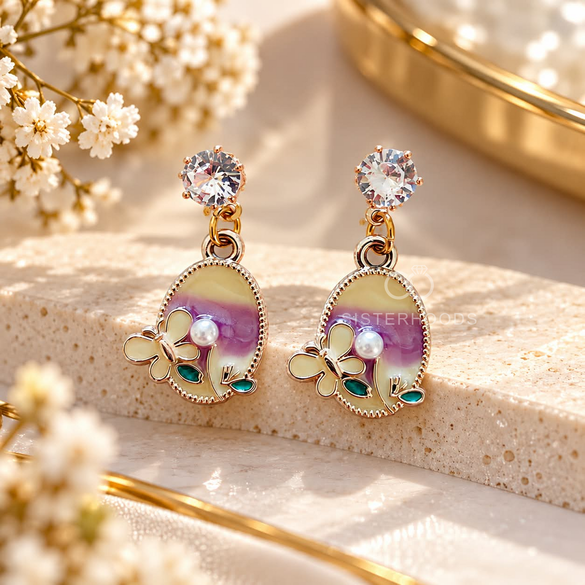 Multicolour butterfly dangle earrings with faceted stud tops, pearl accents and garden-inspired oval pendants | SISTERHOODS-SHA256:bfb14e91f097325eeeecb35158a4be55d34159e511ca6a17e67bab8d72d47ce0