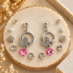 Silver-tone butterfly dangle earrings with faceted pink heart pendants | SISTERHOODS-SHA256:f0df043a8c613ce461cb1a167c5303f31712cc0dc47633e285df49b4e5280dca