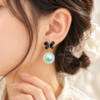 Black butterfly earrings with iridescent aqua round drops | SISTERHOODS-SHA256:cd18886f44f879730fd227b6202d4a62f1fe66daf95e3d6033ae3ebb97c7bf73