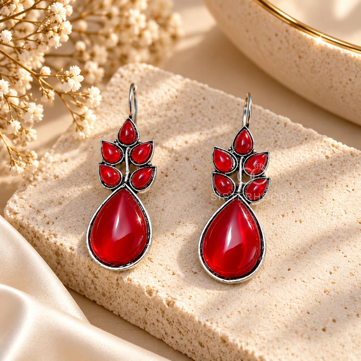 Red leaf-inspired oxidized dangle earrings with silver-tone detailing | SISTERHOODS-SHA256:ffbae6bcc245aea439241f98f98f5489e2099d712059d5f8d5306d63fa93deab