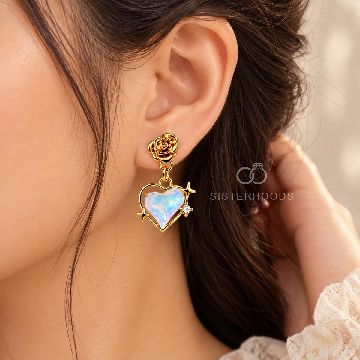 Gold-toned dangle earring with rose stud, blue heart pendant and star accents | SISTERHOODS-SHA256:bd5d67692590b09fd6db48b2cbbaad4a371ed71be563a0acaf28588004f287f5