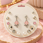 Multicolour assorted earrings set with floral, heart, pearl and sparkling designs | SISTERHOODS-SHA256:6e6398ce04629d9d137fe9b62309236e58105a3336a613a503d19c8ffc726b9d