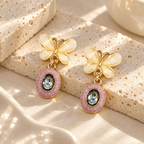 Korean drop earrings with ivory flower tops, pink oval accents and faceted blue centres | SISTERHOODS-SHA256:7b8c3ea6a05ec12db9e6c6bb0cd569dd8ecbc1b76622899ce07b8c0beb37f2d4