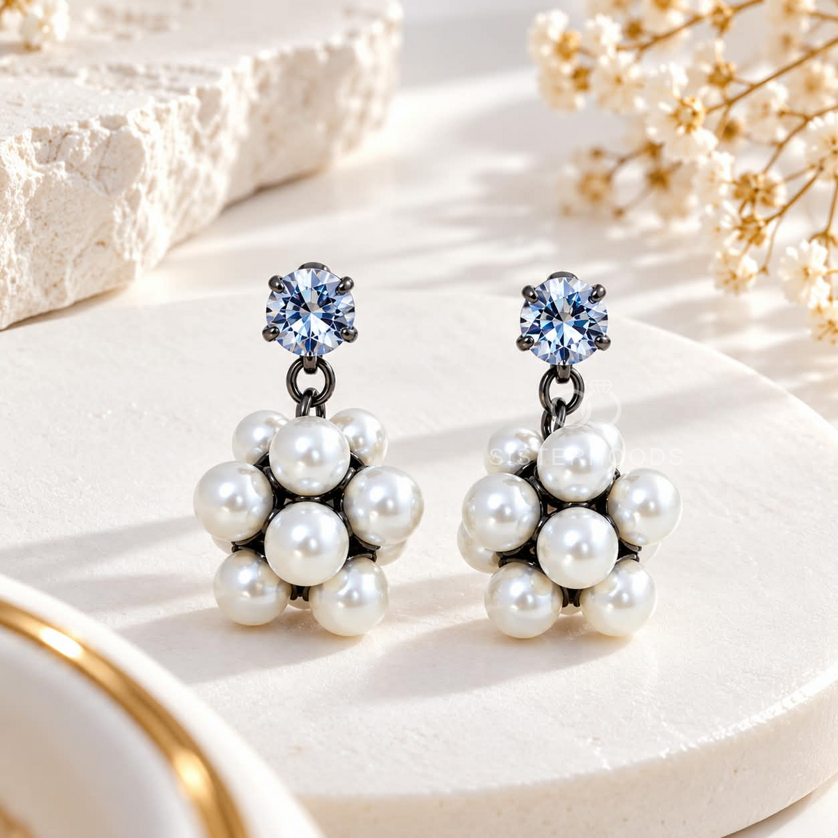 White pearl cluster dangle earring with a blue faceted stud accent | SISTERHOODS-SHA256:0f0c9d092e8d0fb356cbe647ce6d2c51b44e51172669c9103410d2f1539916b9