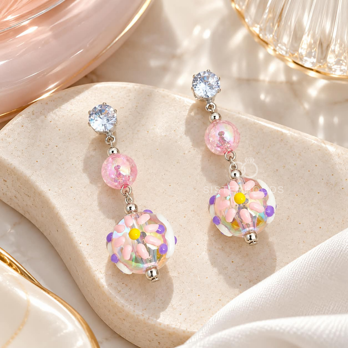 Multicolour Korean dangle earrings with sparkling studs, pink beads and floral-inspired round charms | SISTERHOODS-SHA256:33de0316818913b0ff427559de659061ba10feacf666c3b824a4193da9a2b427