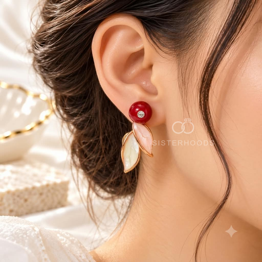 Multicolor leaf-inspired drop earrings with red round studs and blush ivory dangling accents | SISTERHOODS-SHA256:e37b5eef1f322245d8adffbf6368fa27a30d9e48f8cce8d4c8b8773b0e53be78