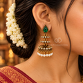 Green teardrop jhumka earrings with crystal accents and white bead fringe | SISTERHOODS-SHA256:72091d1846af149acfa1f89f6cdb78f57d75558c115cb9041a620f86ac62c668