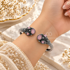Adjustable silver-black cuff bracelet with ornate detailing and lavender oval accents | SISTERHOODS-SHA256:1d576f0b22508740eefe1323c84501057e0ba7c76f708526234e1bf0d20acda5
