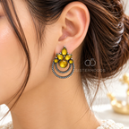 Golden floral oxidized dangle earrings with yellow stones and layered circular hoops | SISTERHOODS-SHA256:5b50e871a2a2f7d77c9c2fad59cf5abd2692b055b878668c24d17aed52fe7102