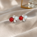 Multicolour geometric stud earrings with red, white and clear faceted accents | SISTERHOODS-SHA256:4bee5b217e5f68d84790032313da3f4fb971dae749a9e9b5a2193ef3a3726767