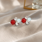Multicolour geometric stud earrings with red, white and clear faceted accents | SISTERHOODS-SHA256:4bee5b217e5f68d84790032313da3f4fb971dae749a9e9b5a2193ef3a3726767