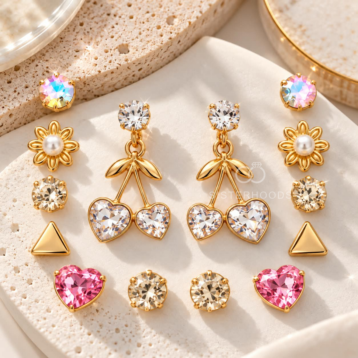 Gold-tone dangle earrings with faceted round accents, leafy details and twin heart charms | SISTERHOODS-SHA256:7c538d29ce8a68d70f833a54094268f24b20ec7c57a33d7c5897afa2efb2d3fc