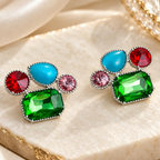 Multicolour faceted geometric cluster stud earrings with green, blue, red and pink accents | SISTERHOODS-SHA256:b9f74f5b746e9b6958f97a70d6489de2465b246b2a81bca485509427c49442d2