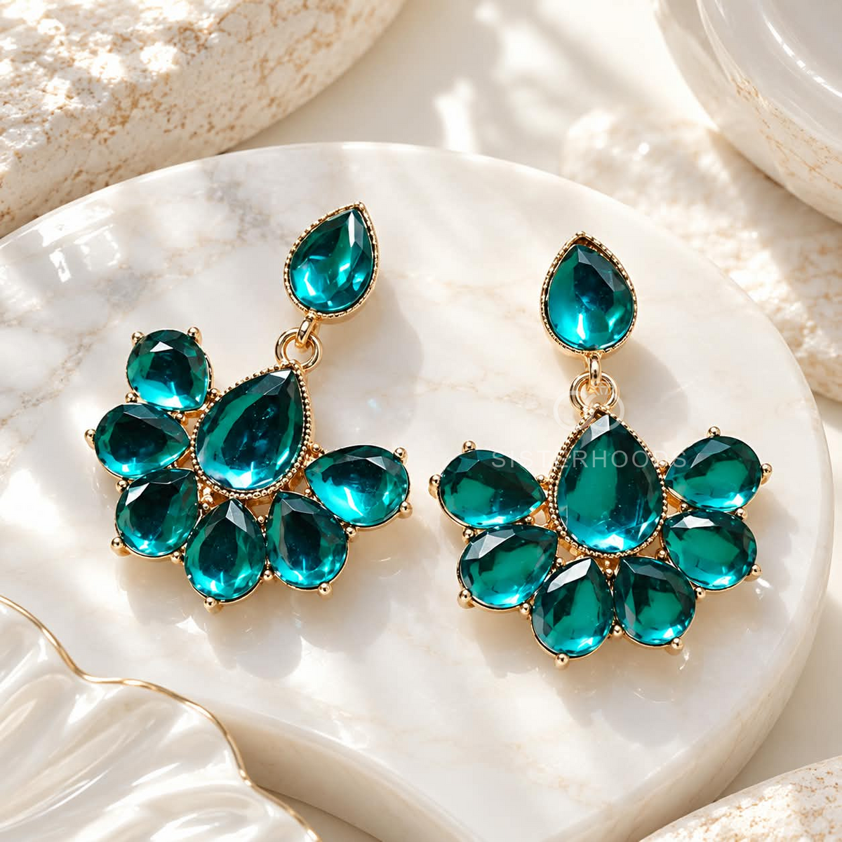 Teal faceted floral dangle earring with clustered petal design | SISTERHOODS-SHA256:56abd6f198af386ac6a4ebdcc7b8f790dfad8f6c16b0375a0eb802897585663f