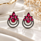 Red floral oxidized dangle earrings with concentric circular detailing | SISTERHOODS-SHA256:d14f013cc9de8a323c3c74eb20b9c171bda71969397891885f5674e655b3b750