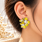 Yellow and white floral stud earring with a pearl centre | SISTERHOODS-SHA256:7f39a08f147171cfc826062577b661afb6dafc4a162f2249e7fc269bda5e2069