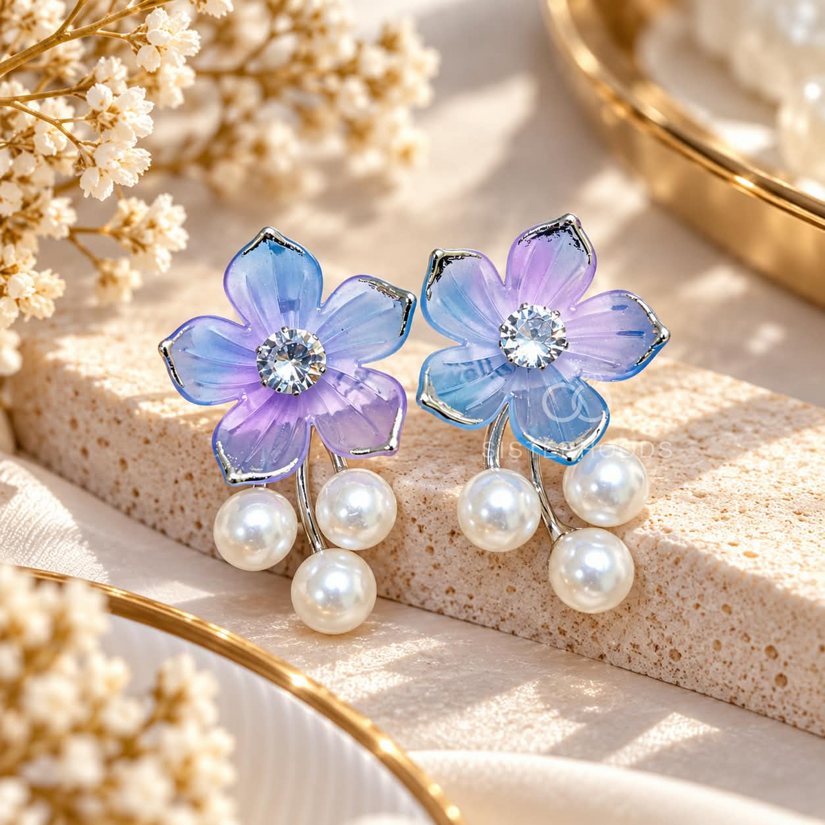 Pastel blue and lilac floral earrings with sparkling centres and three white pearl drops each | SISTERHOODS-SHA256:a2135800881291f734a045205b0a46bfc04243b9e98a89e815f3c985bbffa3c1