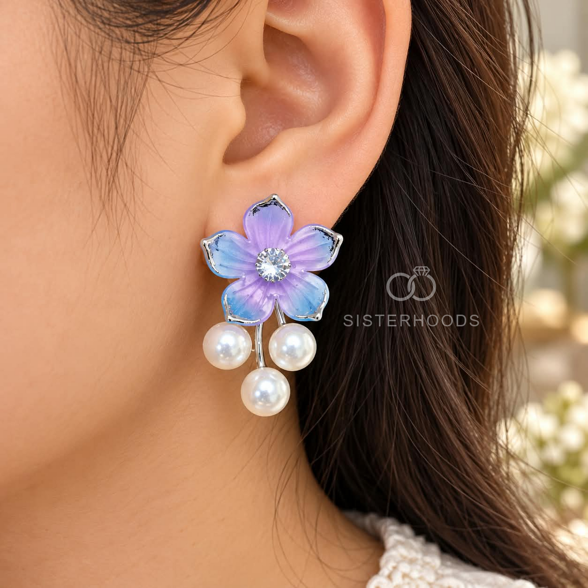 Pastel blue and lilac floral earrings with sparkling centres and three white pearl drops each | SISTERHOODS-SHA256:6efe91ec79db580a7c352d027c0f556f0d1d209c0df26320d6eeb50badbbbeb5