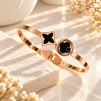 Rose gold-tone cuff bracelet with black geometric motifs | SISTERHOODS-SHA256:37a3f9f96b8da96ce4f792a1c01df6a8db09018a1413421ba0283eee950494fe