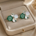 Geometric green, silver, white and pink faceted stud earrings | SISTERHOODS-SHA256:9430b07b75d47bfd9267395f23175ee83206d12dc16573c8c984a6fc3230dadb